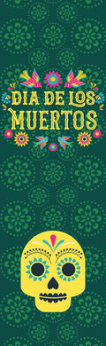 A traditional green banner for Dia de los Muertos, featuring a skull and other decorative elements.