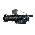 A black projector with a gobo lens, mounted on a black tripod. The projector has a rain proof cover and a variety of buttons and dials.