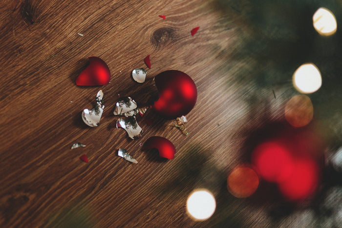 Broken ornaments on the floor.