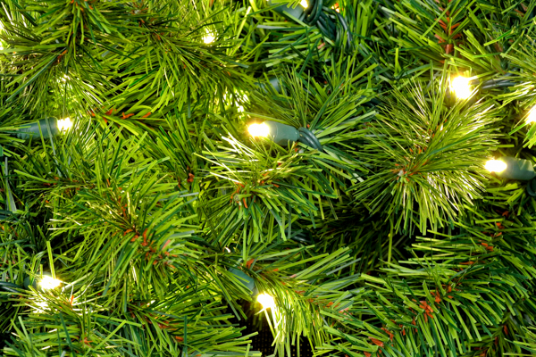 A festive Christmas tree adorned with colorful ornaments, creating a cheerful and inviting atmosphere.