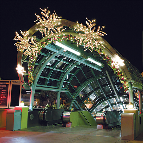 Dekra-Lite 5' Deluxe Forked Snowflake LED Lit Pole Mount displayed on a structure