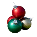 Dekra-Lite Giant Fiberglass Ornament Stacks. Containing 2 red, 1 green, and 1 gold ornament.