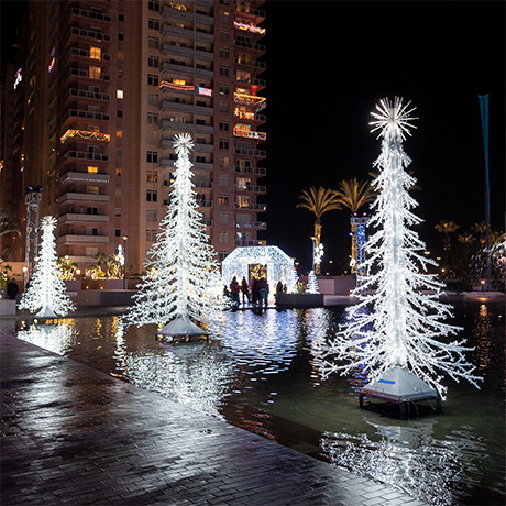 A decorative crystal branch tree, formed entirely from a network of cool white lights on a sturdy metal frame. This versatile piece offers a shimmering wintery effect.