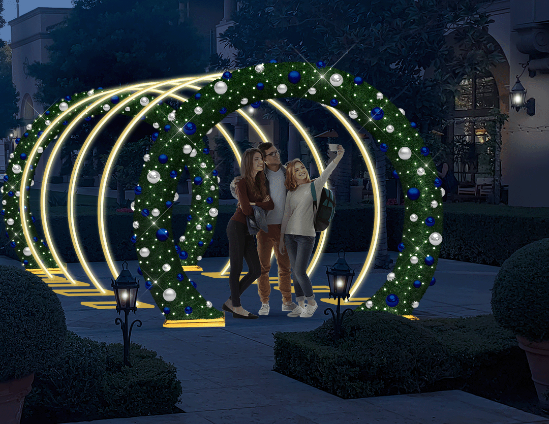Illuminated Christmas tunnel opening decorated with warm white lights  creating winter wonderland display