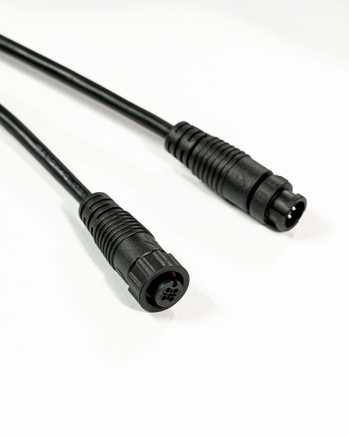 Dekra-Lite Black Extender Cable Ends Close Up