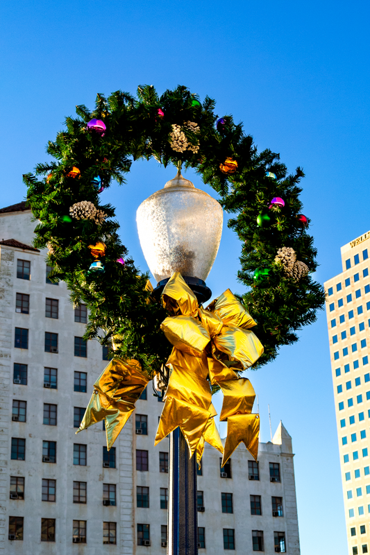 Dekra-Lite 60" Silhouette Wreath w/ Gold Structural Bow on Lamppost