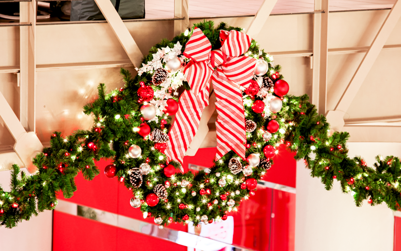 Dekra-Lite 18" Candy Cane Structural Bow on Decorated Wreath & Garland