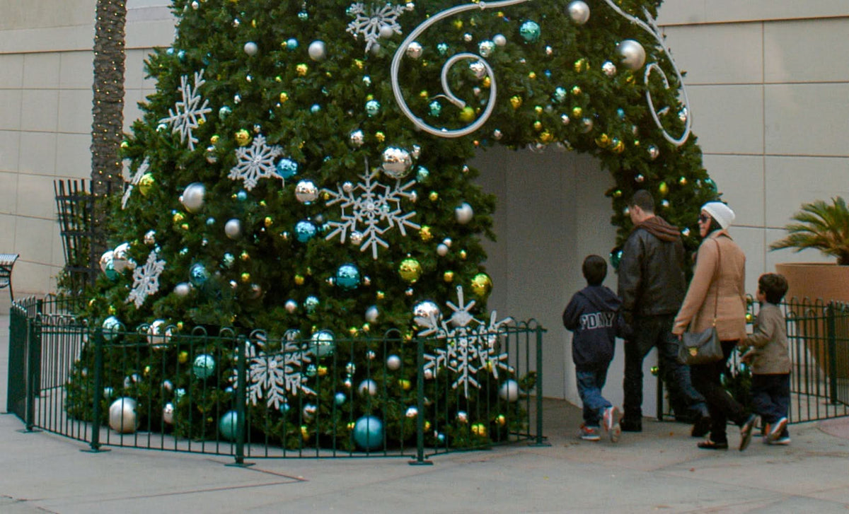 Dekra-Lite Green Metal Holiday Fence around Walk Through Christmas Tree